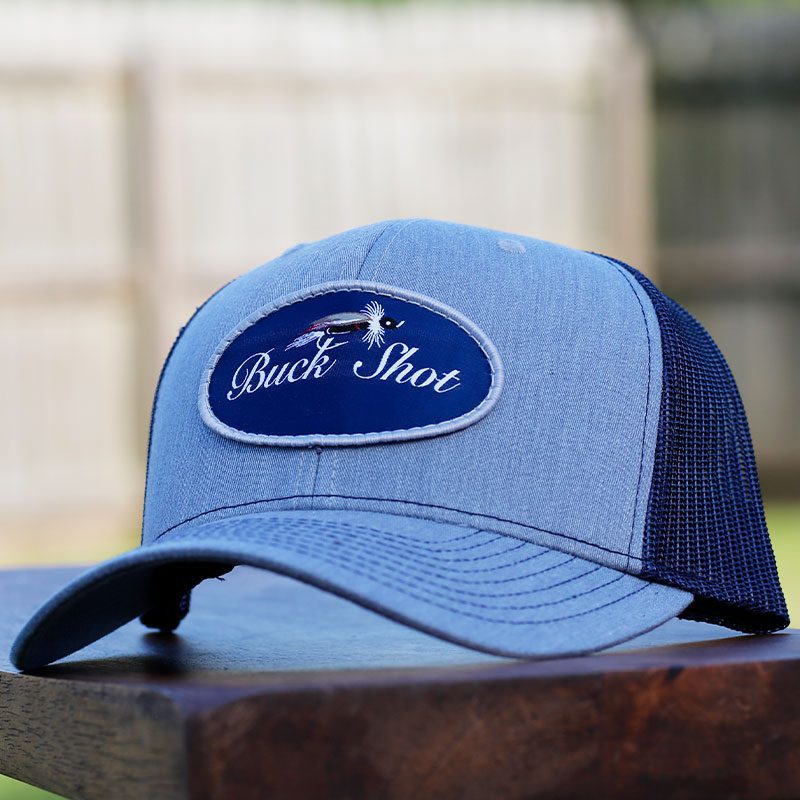 A blue hat with a patch on it
