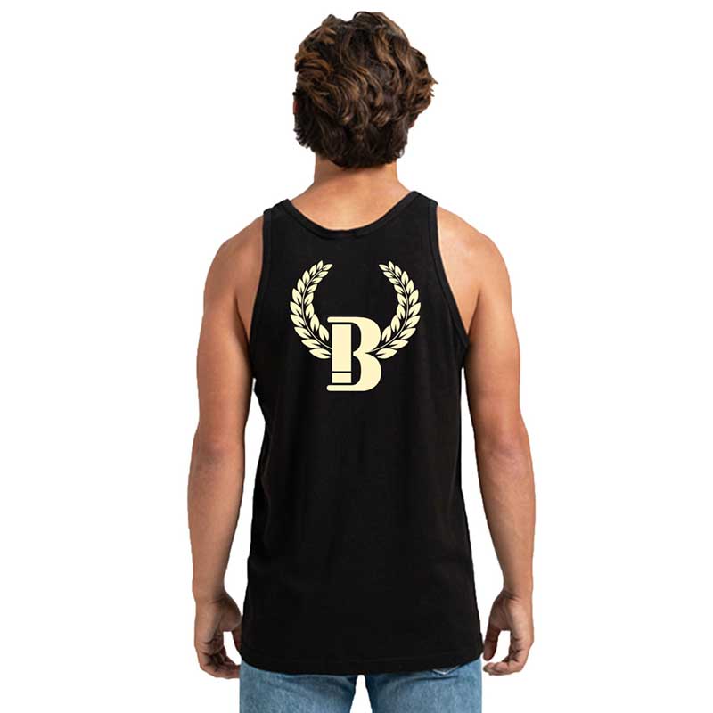 A man wearing a black tank top with the letter b on it.