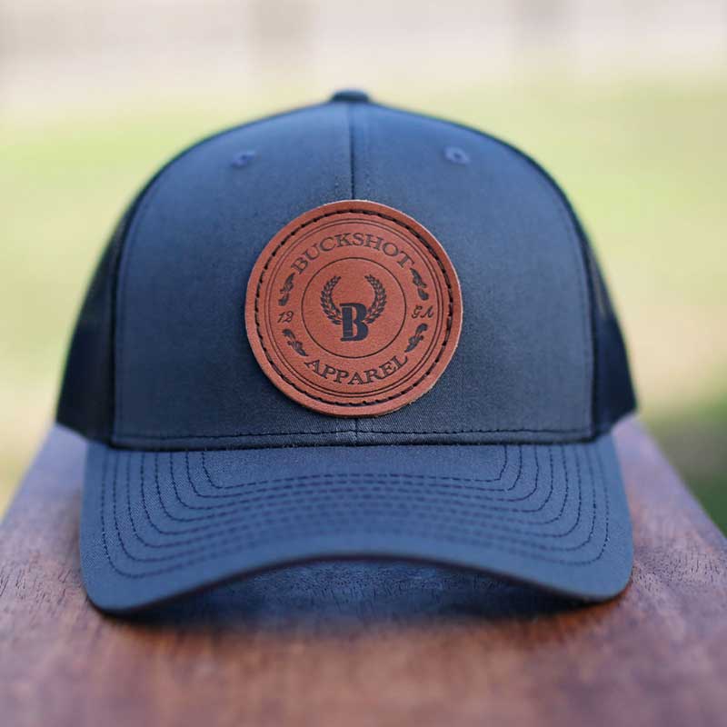 A hat with a leather patch on it