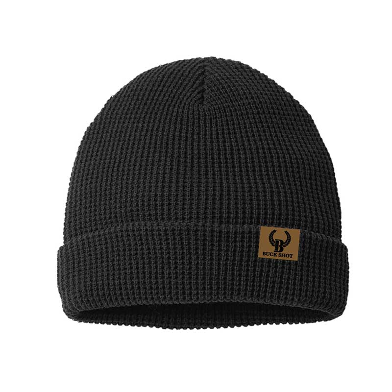 A black beanie with a brown patch on it.