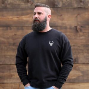A man with a beard and a black sweatshirt