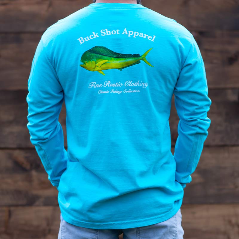 A man wearing a long sleeve shirt with a fish on it.