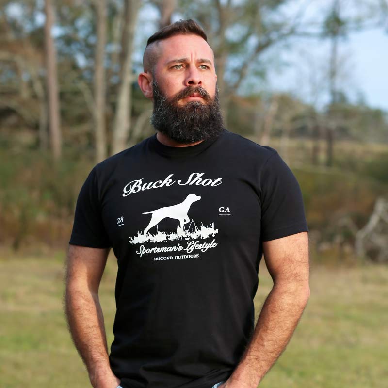 A man with a beard and a black shirt