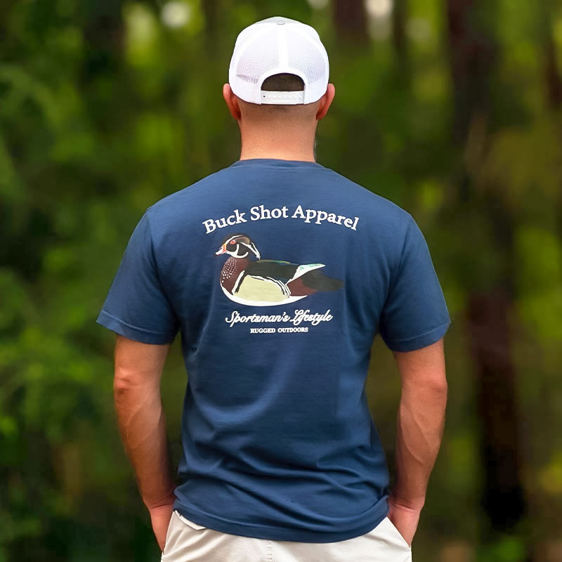 Man wearing a t-shirt with a graphic of a Wood Duck