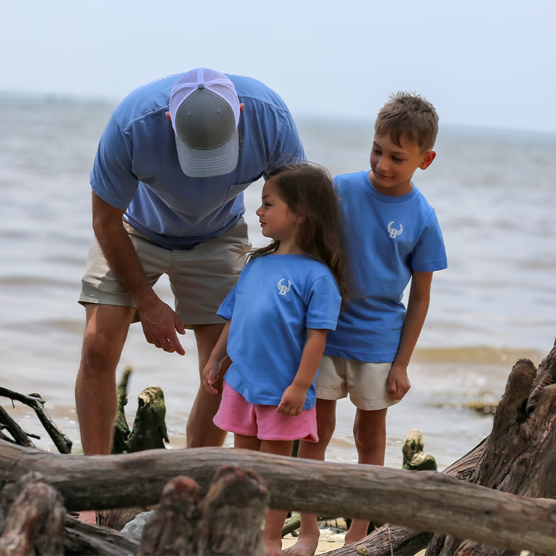 Front view of God Guns and Grit t-shirt Family wearing God Guns and Grit matching t-shirts